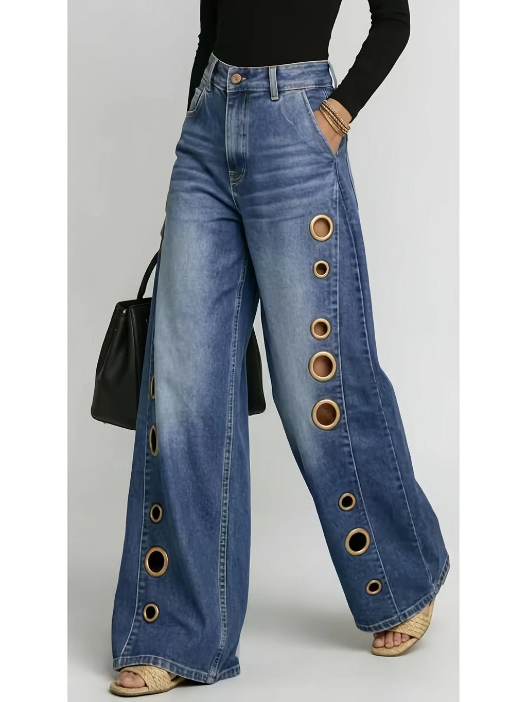Wide-leg jeans with metallic eyelets