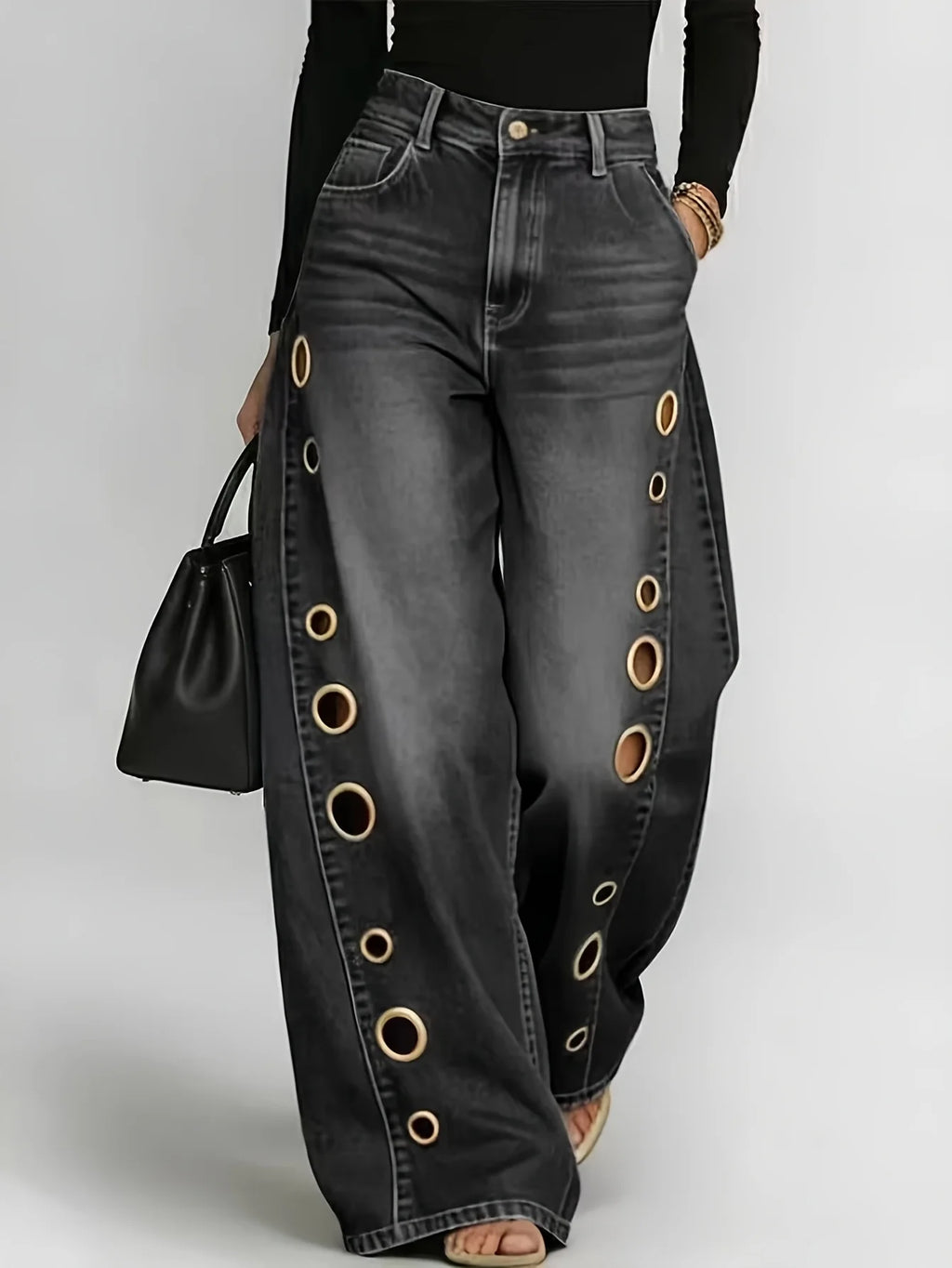 Wide-leg jeans with metallic eyelets