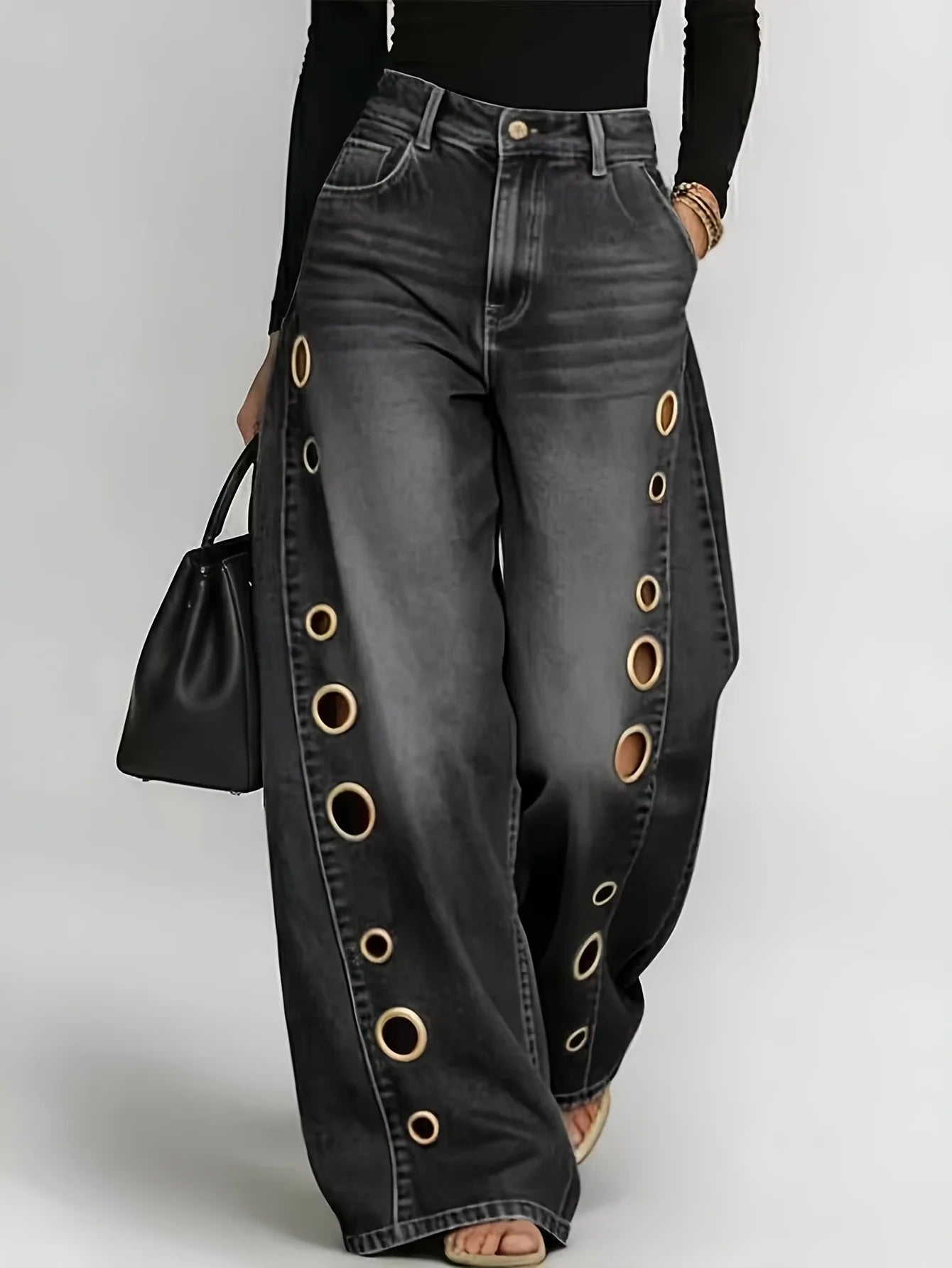 Wide-leg jeans with metallic eyelets