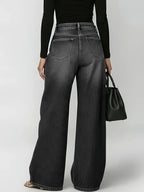 Wide-leg jeans with metallic eyelets